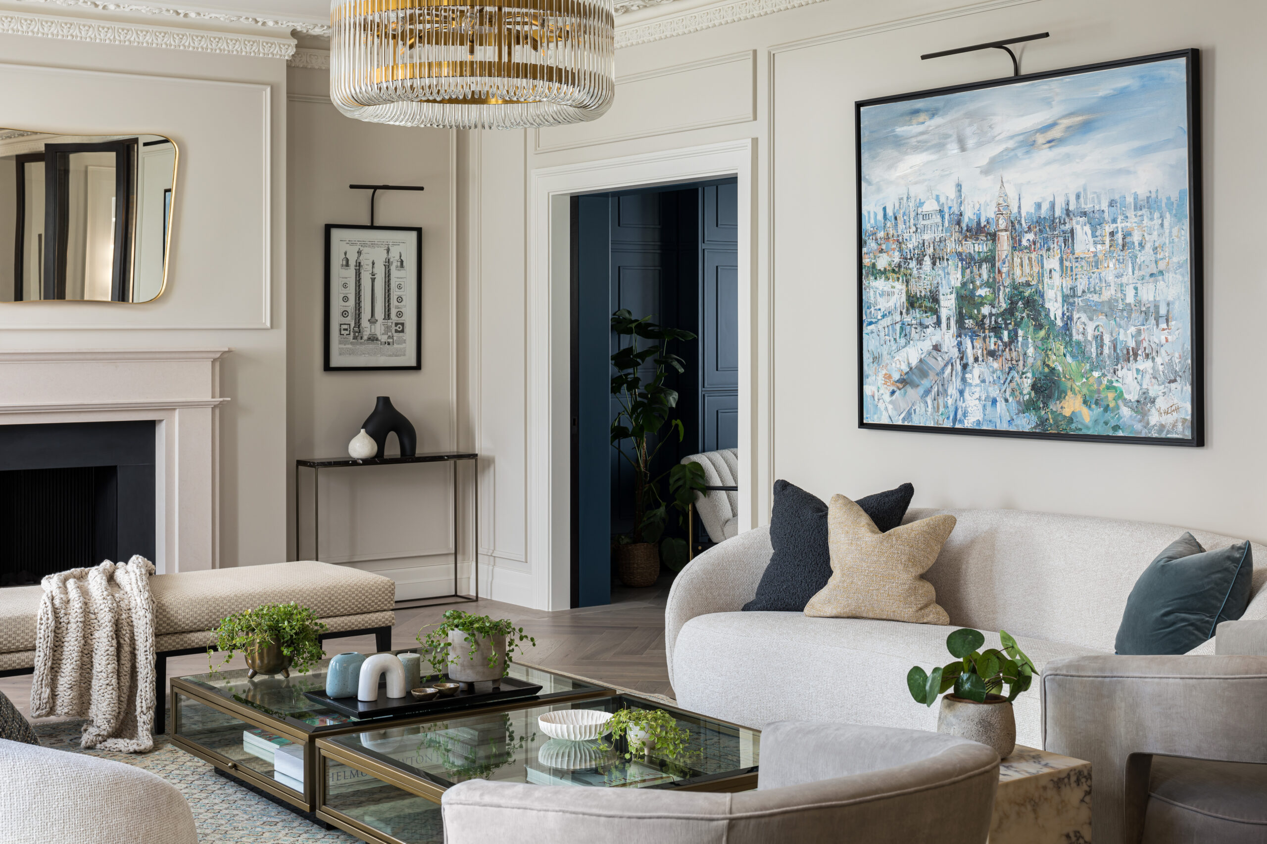 Stylish light living room with cream sofas